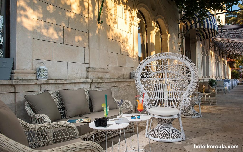 Lovely lounge area on the terrace with comfy and modern garden furniture